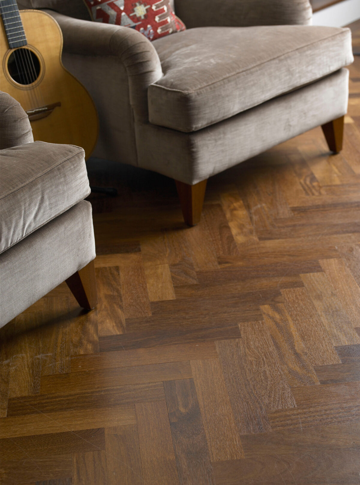 mid-century modern herringbone floor in sustainable sucupira hardwood