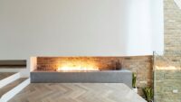 M Clayton tate bute herringbone floor with modern fire placewidth=