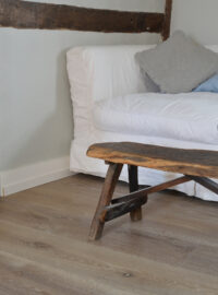 Oak landmark dyrham planks with a white sofa and a wooden benchwidth=