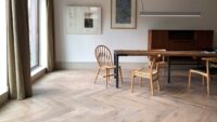 modern parquet flooring used in dining room